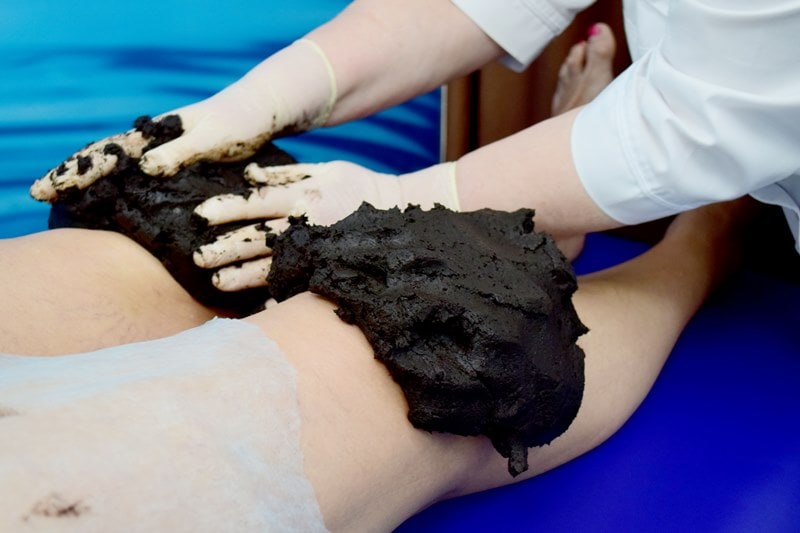 Лечение грязью коленей